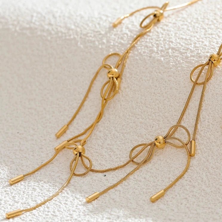 Gargantilha Laço Dourado