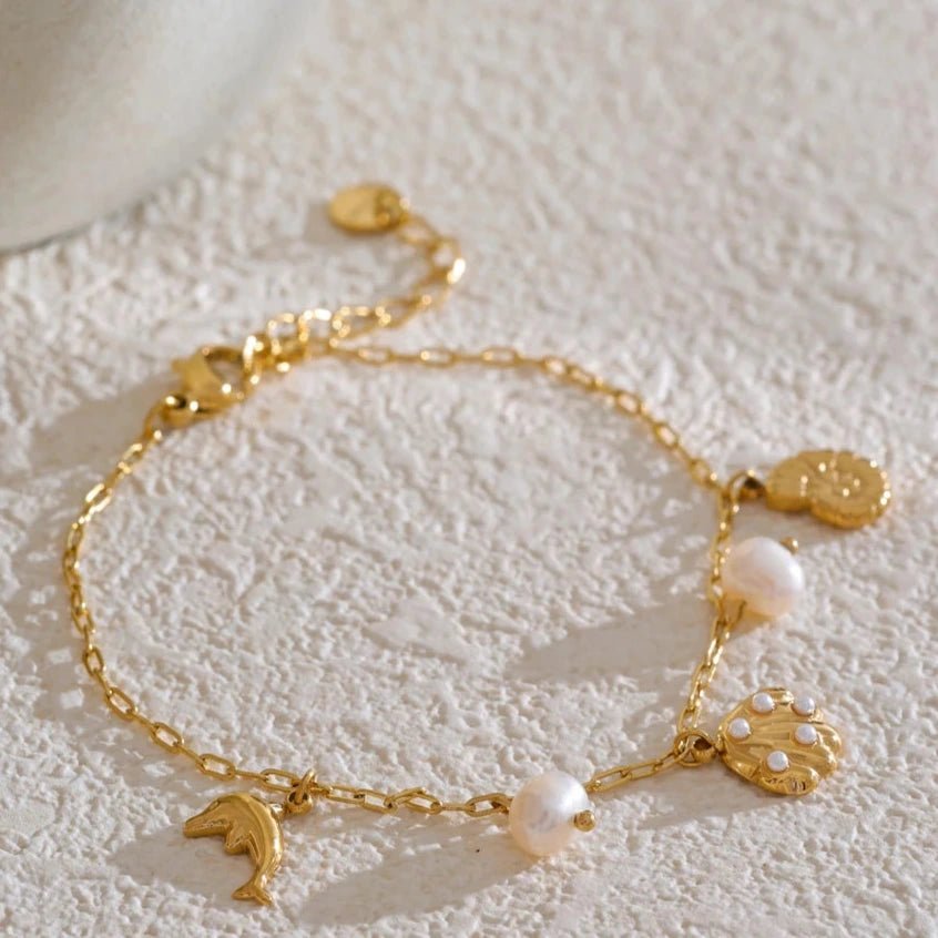 Pulseira Concha Dourada - Amare_27 folheada a ouro da Vonn | Vonn