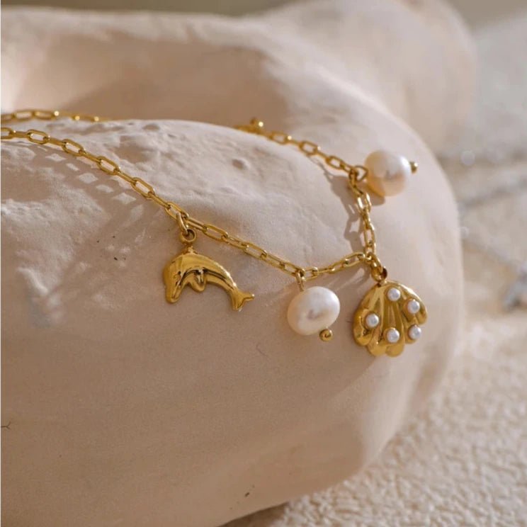 Pulseira Concha Dourada - Amare_27 folheada a ouro da Vonn | Vonn