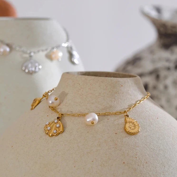 Pulseira Concha Dourada - Amare_27 folheada a ouro da Vonn | Vonn